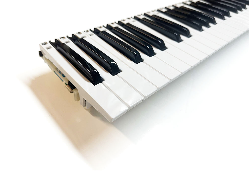 Keybed assembly, 61-note