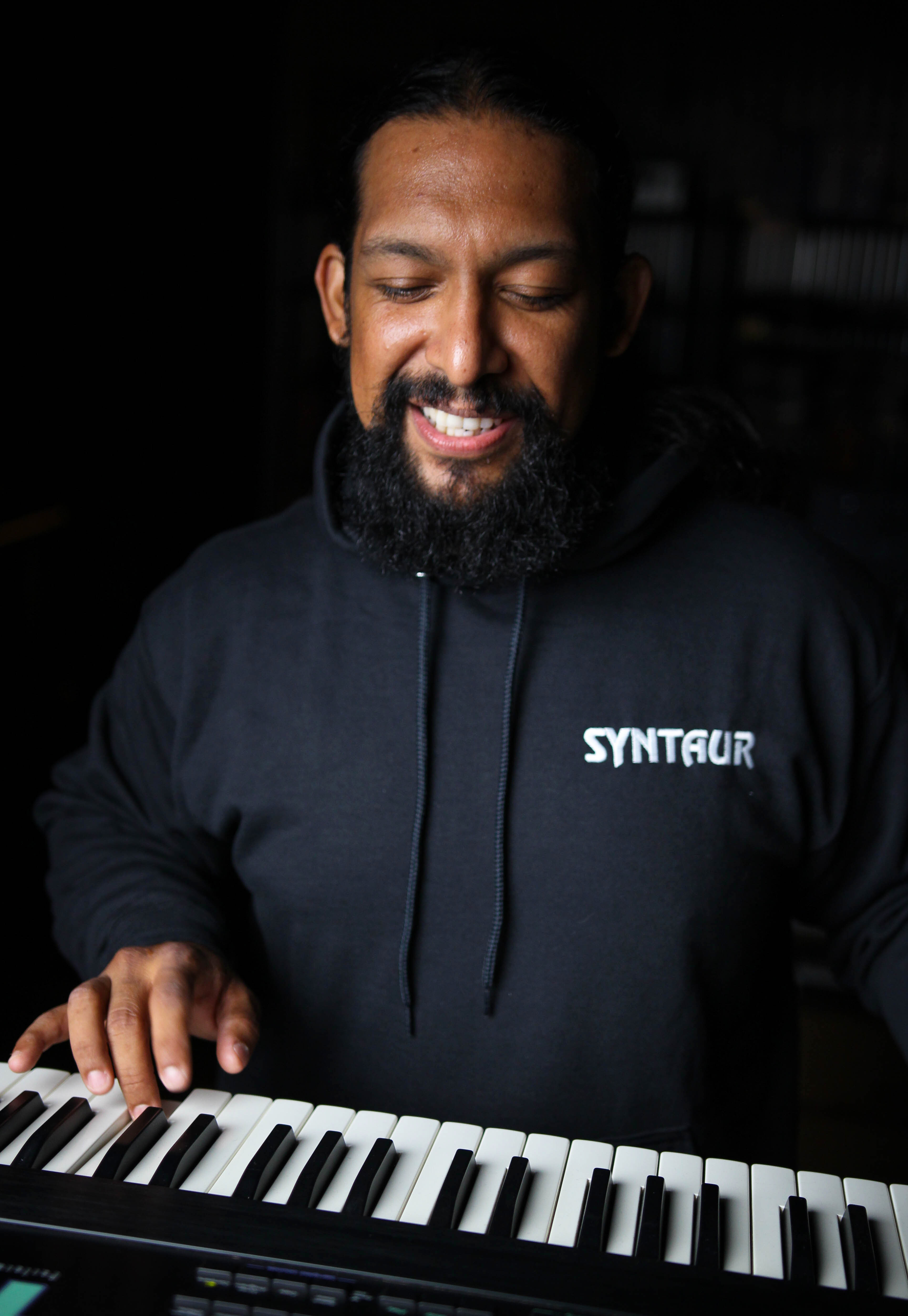 Black hoodie with Synaur logo